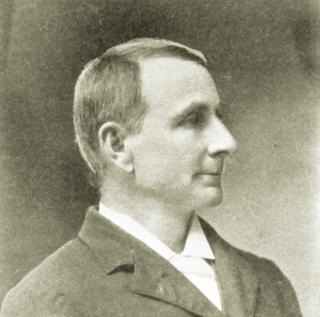 A black and white portrait of TCU创始人艾迪生克拉克于1897年